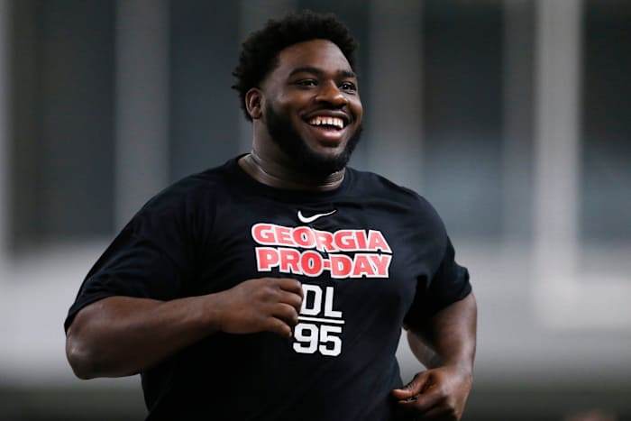 Georgia defensive lineman Devonte Wyatt (95) runs a drill during Georgia's Pro Day in Athens, Ga., on Wednesday, March 16, 2022. News Joshua L Jones